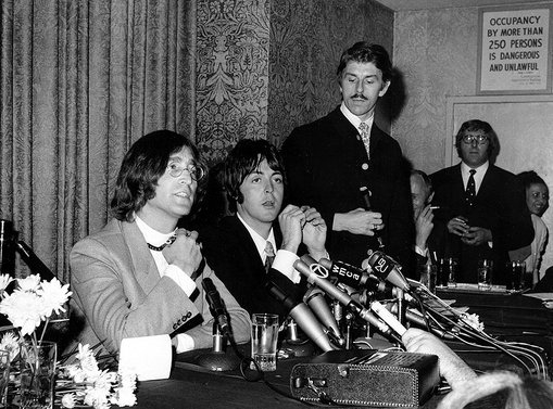 John Lennon and Paul McCartney of the Beatles announce their business venture, Apple Corps, Ltd., at a news conference in New York City on May 14, 1968.