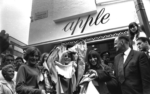Tired of being shopkeepers'” The Beatles’ members give away thousands of pounds worth of Apple stock in Baker Street, London, on July 31, 1968.